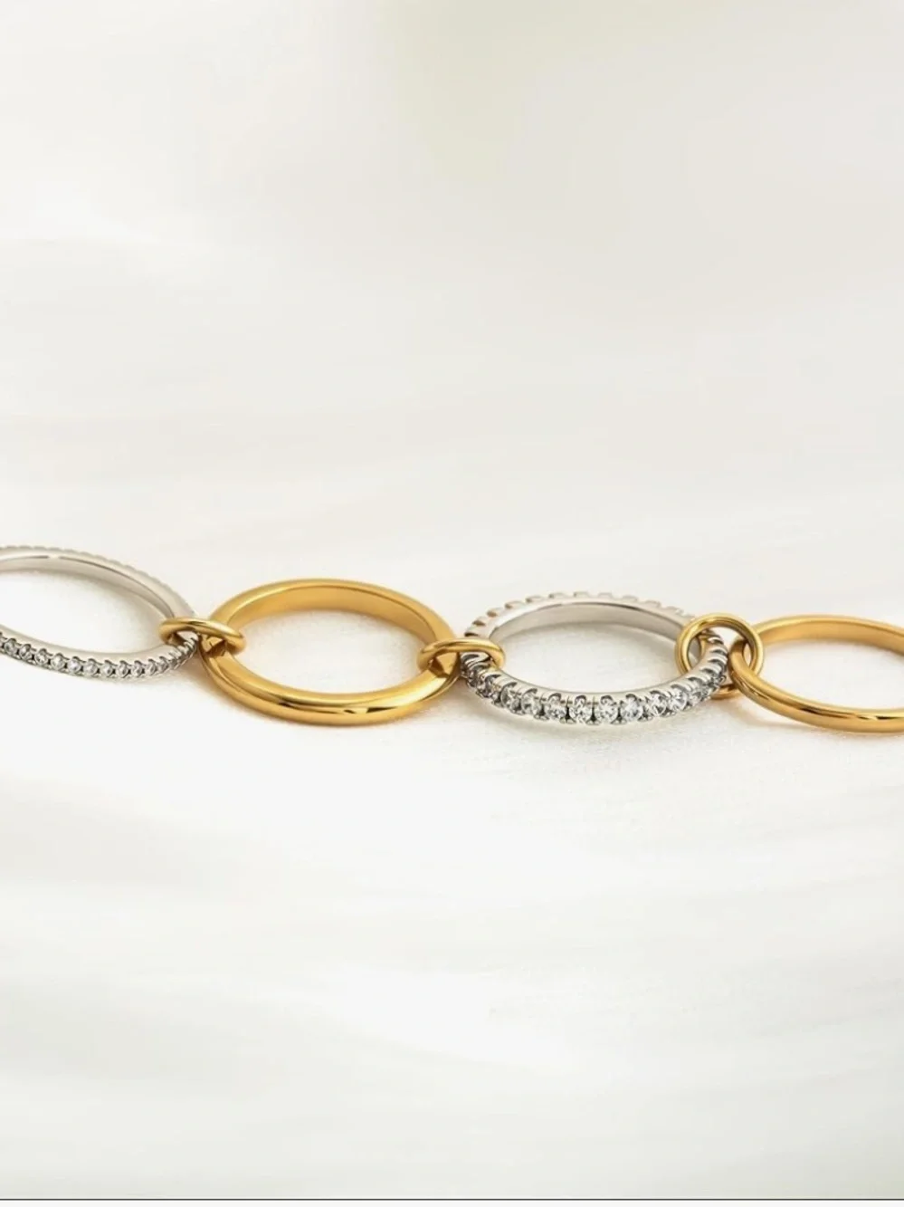 Gold and Silver Crystal Linked Rings